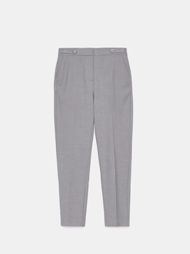 Pantaloni eleganti tip tigara de culoare gri. Au inchidere cu fermoar.