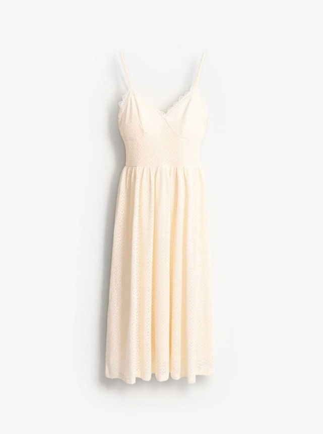 Rochie de vară midi cu bretele. Confecționată din 75% bumbac.