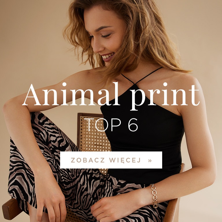 panterka, stylizacje panterka - kobieta w topie i spodniach z szeroką nogawką od MOHITO