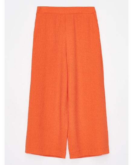 pomarańczowe spodnie typu culotte