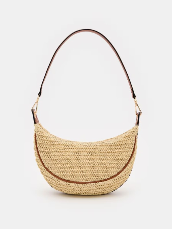 Torebka typu koszyk z paskiem na ramię. Posiada zapięcie na zamek.
