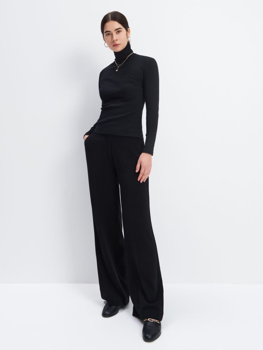 black flowy turtleneck